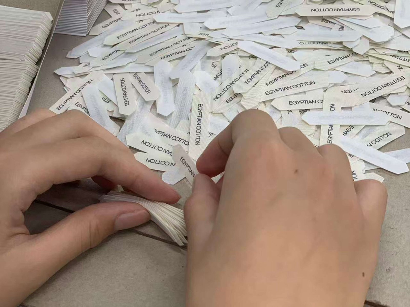 Worker checking label quality